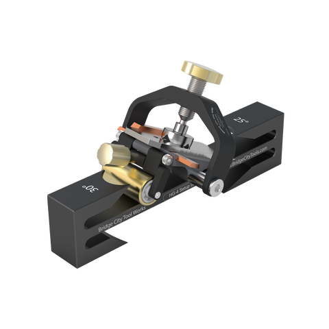 A black HG-4 Honing Guide designed for sharpening irons and chisels, featuring a built-in T-square and adjustment knob.