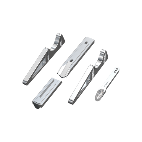Set of silver metal tongs on a white background