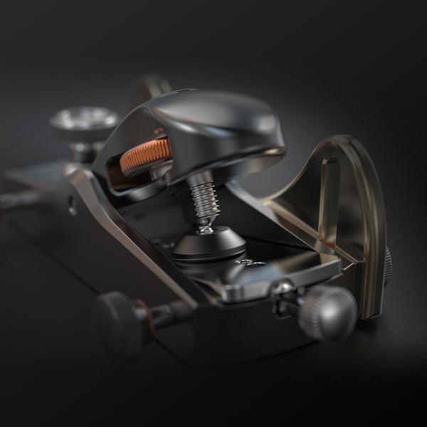 Close-up of a mechanical device with metallic components on a dark background