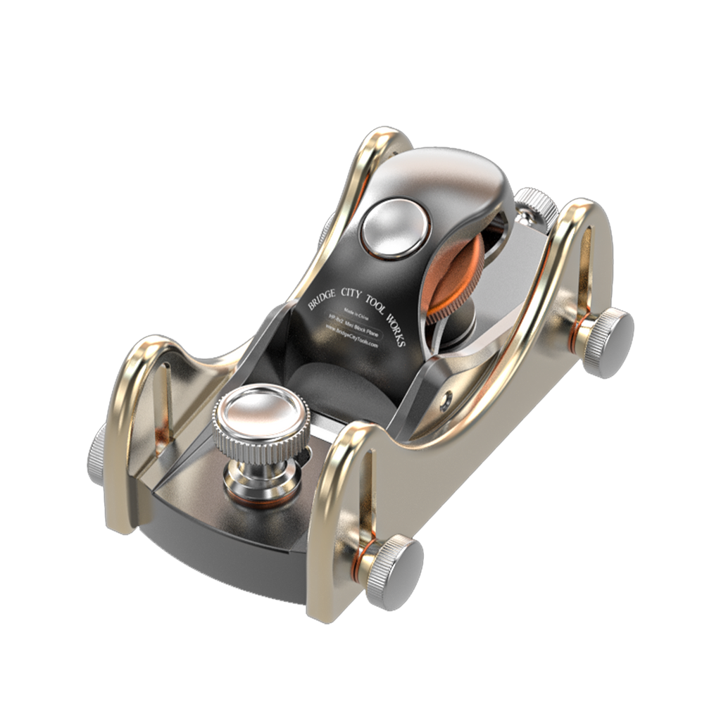 Metallic tool with gold and silver accents on a white background