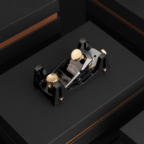 Black Color HP-8X Celebration Edition Mini Block Plane on the surface of a black box
