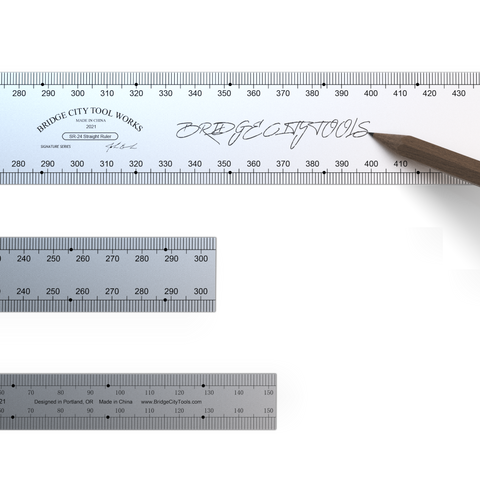 A set of three stainless steel SR series bench rules of different sizes, with laser-etched graduations 