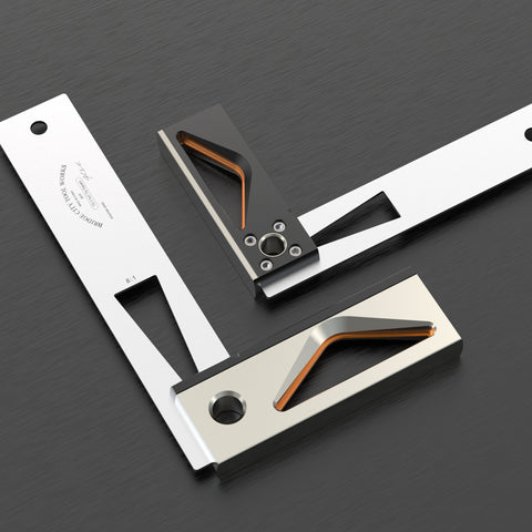 A set of three try squares with stainless steel blades and anodized aluminum handles, displayed on a black background.