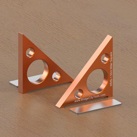two orange Mini Miter Square tool made of aircraft grade aluminum alloy, used for measuring 90° and 45° bevel angles, with an adjustable sliding foot.