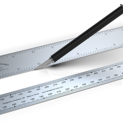 A set of two stainless steel SR series bench rules of different sizes, with laser-etched graduations 