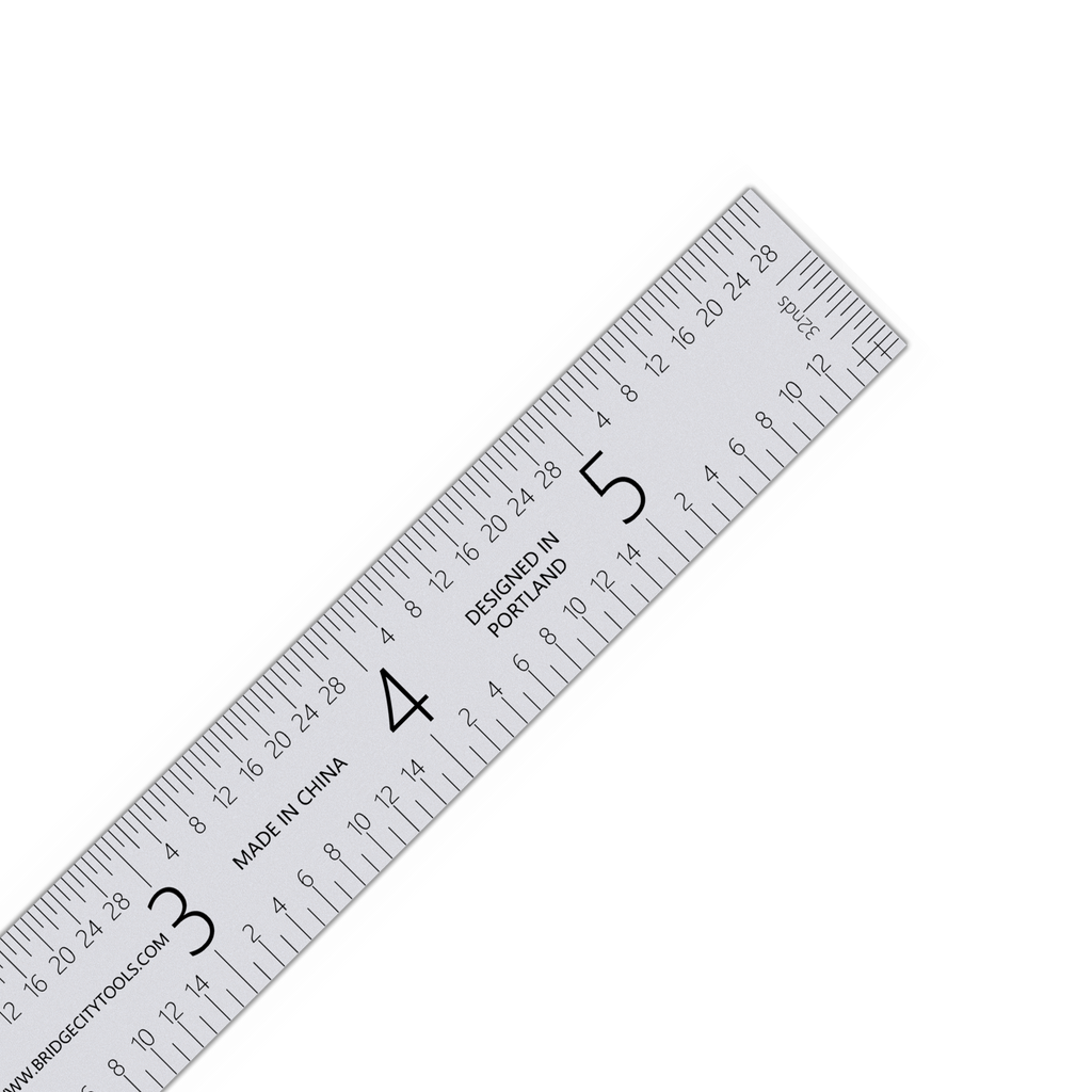 A set of one stainless steel SR series bench rules of different sizes, with laser-etched graduations 