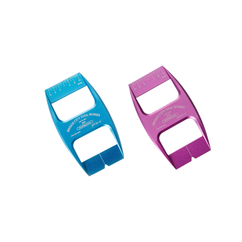 Two magnetic cursors, one blue and one purple, designed for use with an adjustable square for making quick positioning marks on workpieces.
