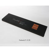 a set of wooden chopstick blanks packed in a box with Padauk on the image
