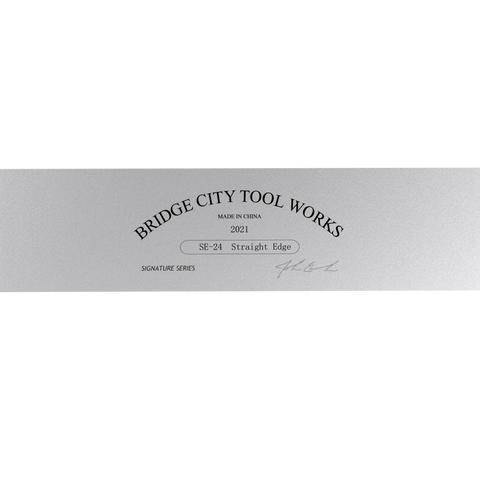 A 24 inch straight edge tool made by Bridge City Tool Works, with a signature series label indicating it's part of a special edition or collection.